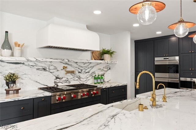 kitchen with tasteful backsplash, premium range hood, light stone counters, stainless steel appliances, and pendant lighting