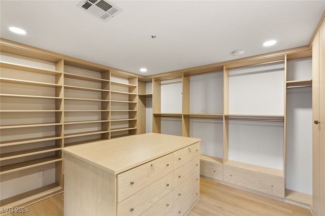 walk in closet featuring light wood-type flooring