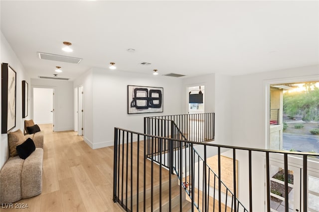 corridor featuring light hardwood / wood-style flooring