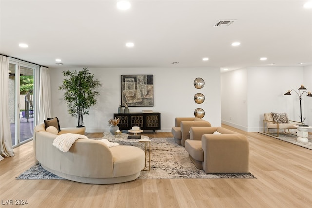 living room with light hardwood / wood-style floors