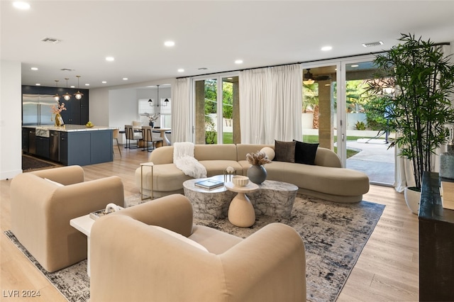 living room featuring light wood-type flooring