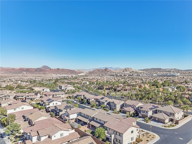 bird's eye view with a mountain view