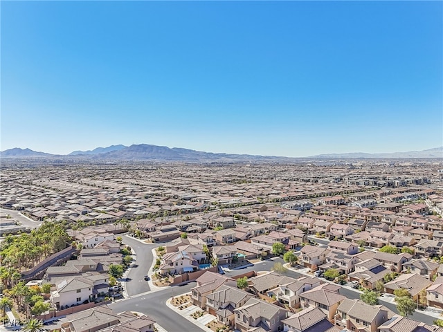 drone / aerial view featuring a mountain view