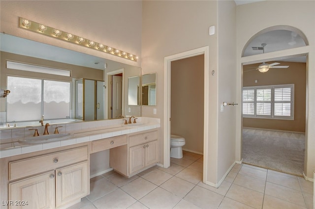 bathroom featuring tile patterned flooring, ceiling fan, toilet, and vanity