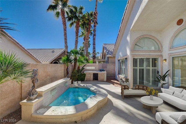 view of swimming pool with a patio area