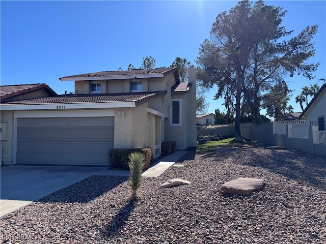 front of property with a garage