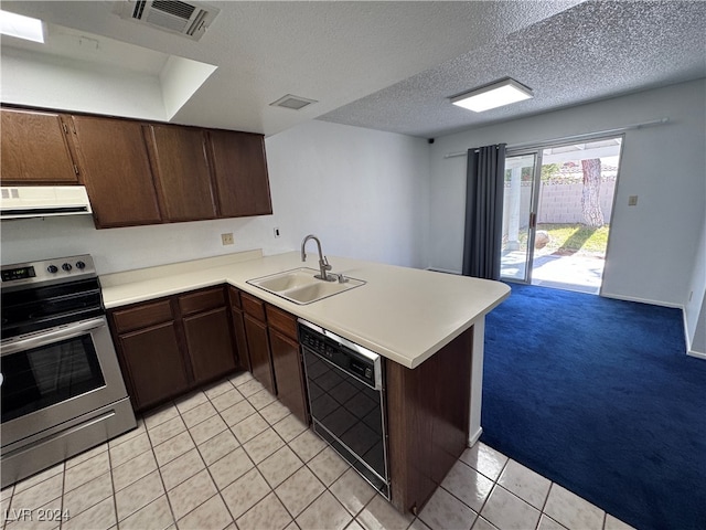 kitchen with black dishwasher, kitchen peninsula, sink, exhaust hood, and stainless steel electric range oven