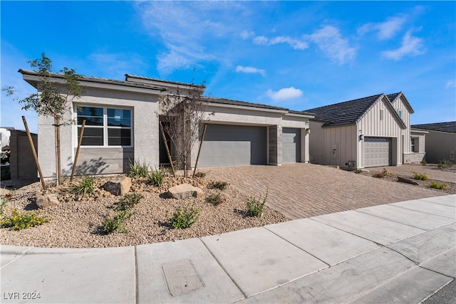 view of front of property featuring a garage