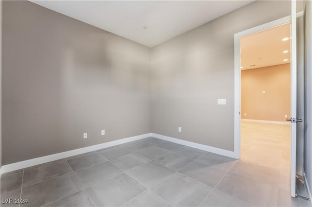 spare room featuring tile patterned floors