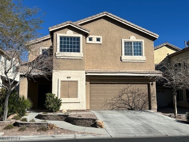 view of front property with a garage