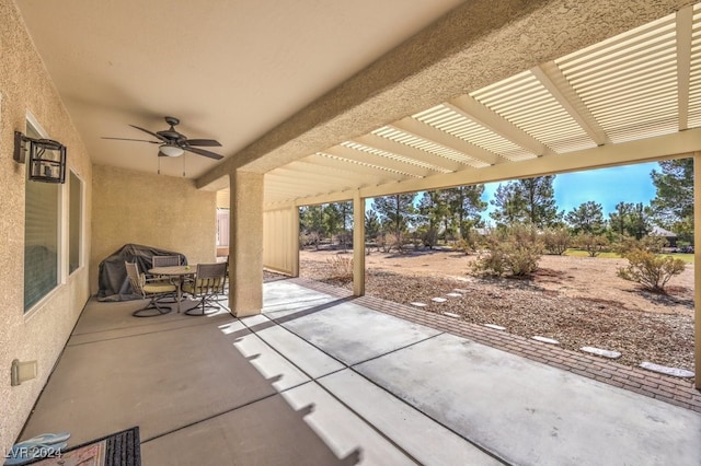 view of patio / terrace with a pergola and ceiling fan