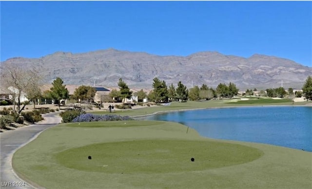 view of home's community featuring a water and mountain view