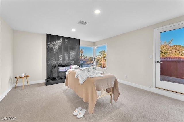 bedroom with recessed lighting, light colored carpet, visible vents, and baseboards