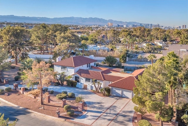 bird's eye view with a residential view and a mountain view