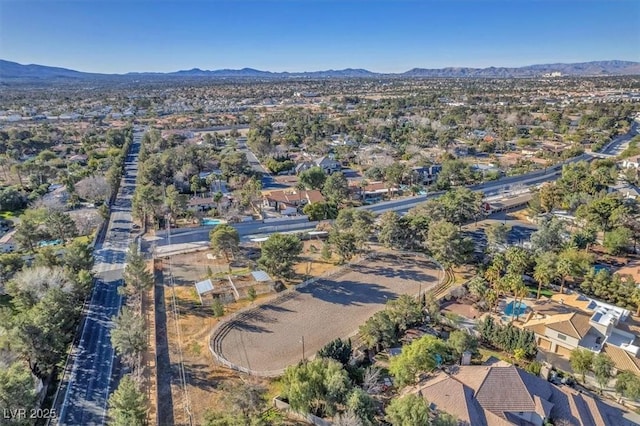 drone / aerial view featuring a residential view and a mountain view