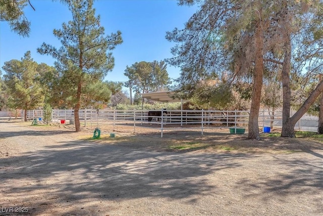 view of yard featuring an outdoor structure and an exterior structure