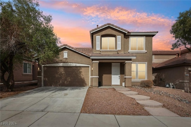 front facade with a garage