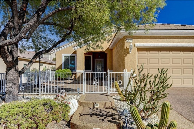 ranch-style home featuring fence and stucco siding