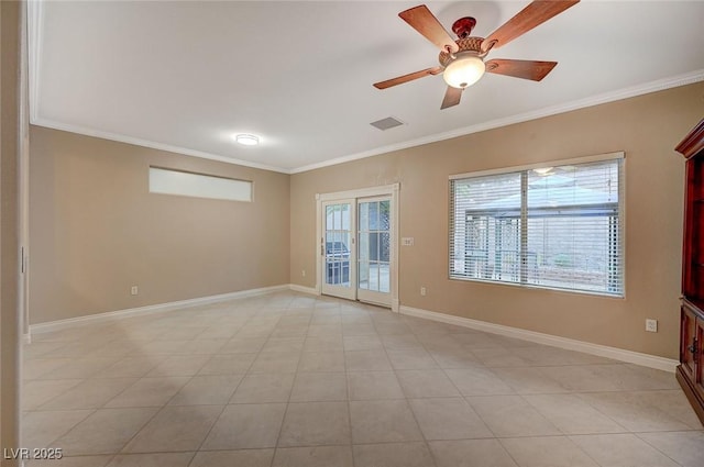 unfurnished room with baseboards, visible vents, a ceiling fan, and crown molding