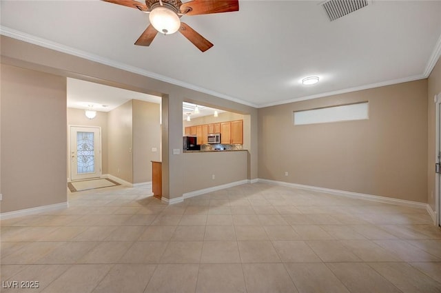 interior space featuring baseboards, light tile patterned floors, visible vents, and crown molding