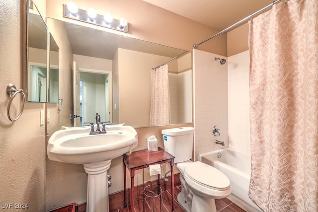 bathroom with shower / tub combo with curtain and toilet