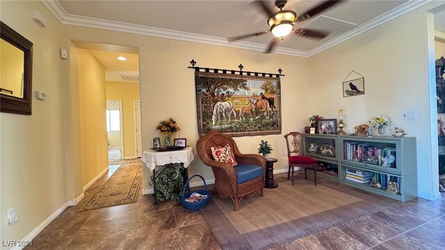 living area with ceiling fan and crown molding