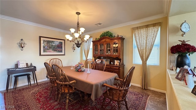 dining space with a notable chandelier and crown molding