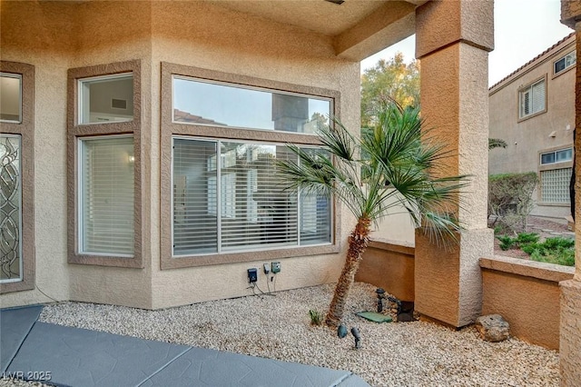 view of property exterior featuring ceiling fan