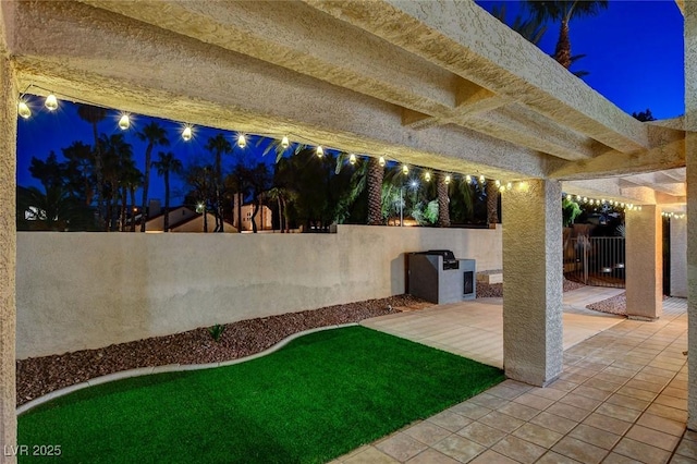 view of patio at night