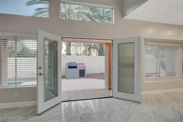 doorway featuring a wealth of natural light and french doors