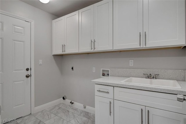 clothes washing area with gas dryer hookup, sink, cabinets, hookup for a washing machine, and electric dryer hookup