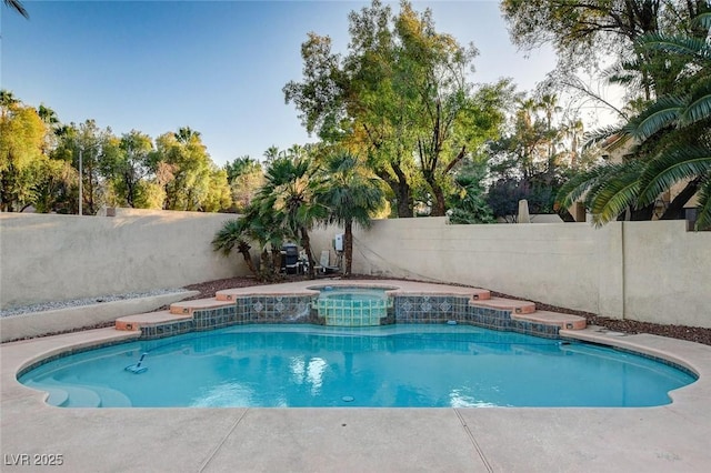 view of swimming pool featuring an in ground hot tub