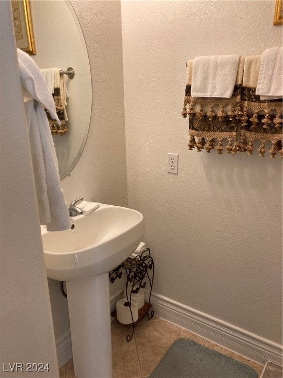 bathroom featuring tile patterned flooring