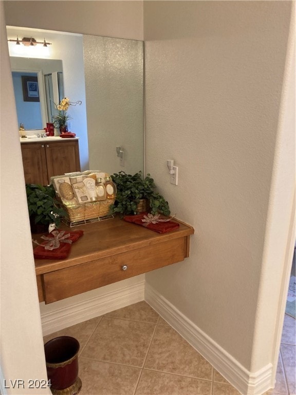 bathroom featuring vanity and tile patterned flooring