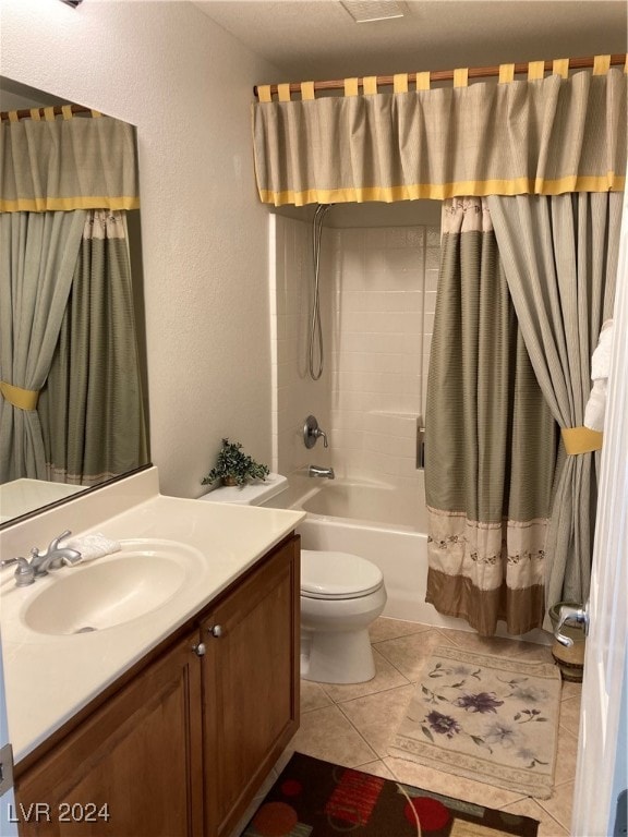 full bathroom featuring vanity, tile patterned floors, toilet, and shower / bath combination with curtain