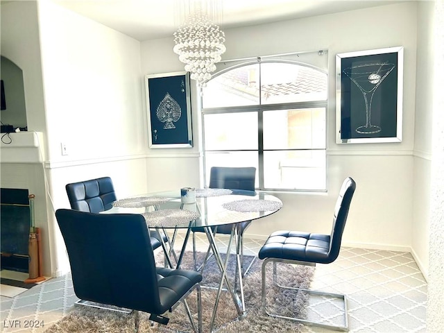 dining room with plenty of natural light and a chandelier