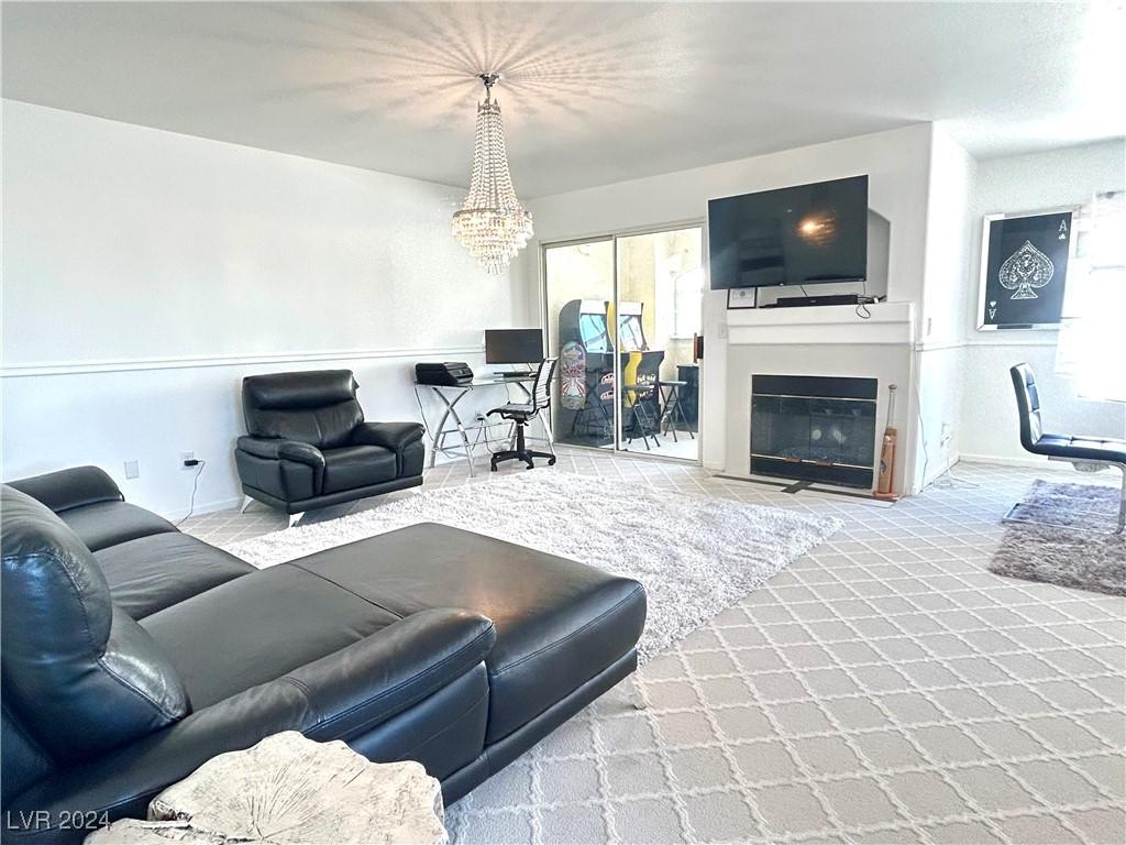 living room with a chandelier