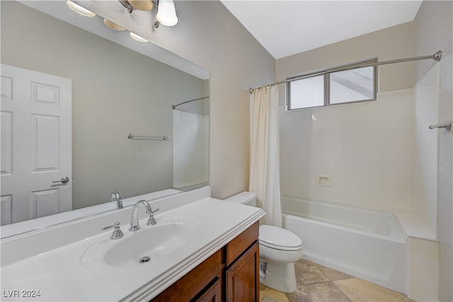 full bathroom with vanity, shower / bath combo with shower curtain, tile patterned flooring, and toilet