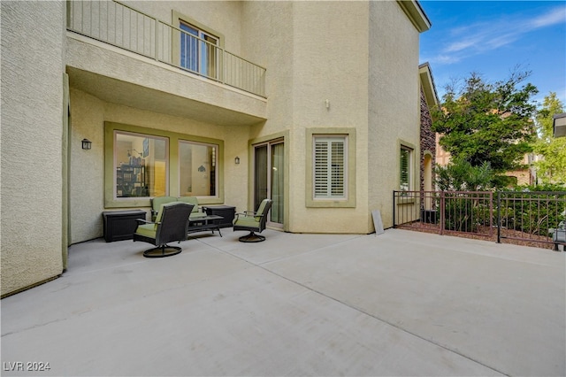 view of patio / terrace featuring a balcony and an outdoor hangout area