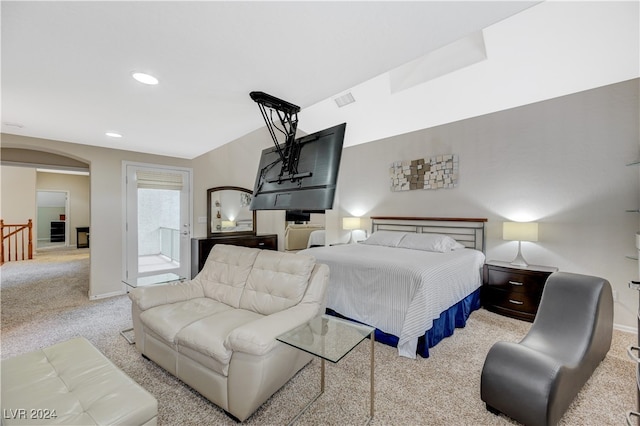 bedroom featuring light colored carpet