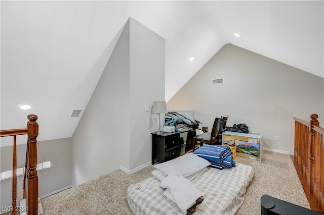 interior space with vaulted ceiling and carpet floors