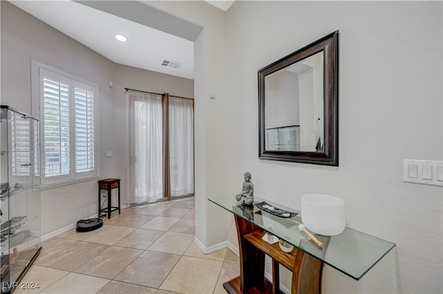 foyer featuring light tile patterned floors