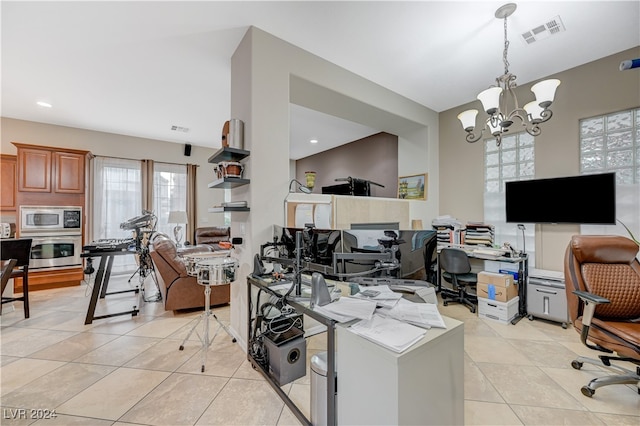 office area with a notable chandelier and light tile patterned flooring