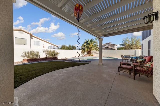 view of patio / terrace featuring a fenced in pool