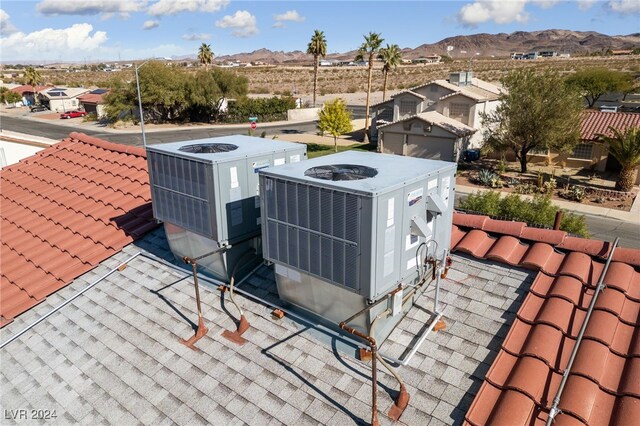 details featuring a mountain view and cooling unit