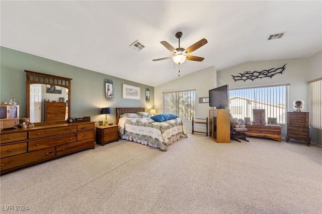 bedroom with carpet, ceiling fan, and lofted ceiling