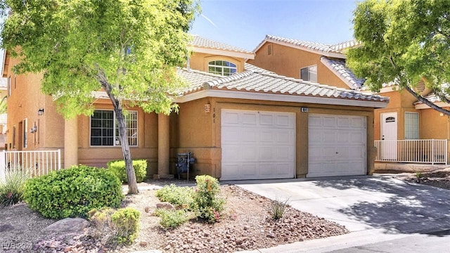 view of front of property featuring a garage