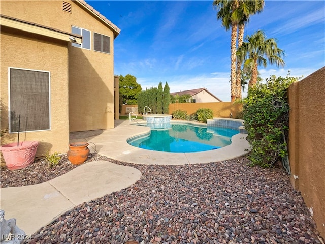 view of pool with a patio area