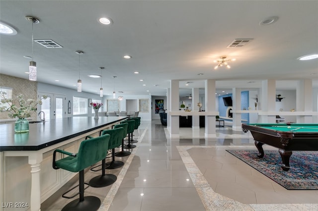 game room with pool table, french doors, and light tile patterned floors