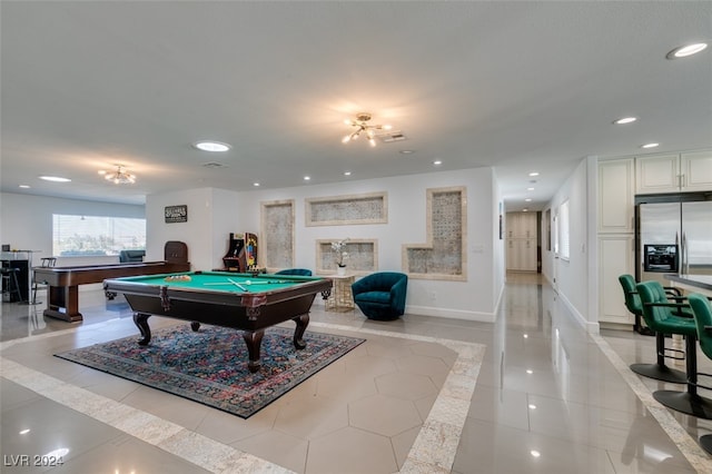 game room with pool table and light tile patterned floors